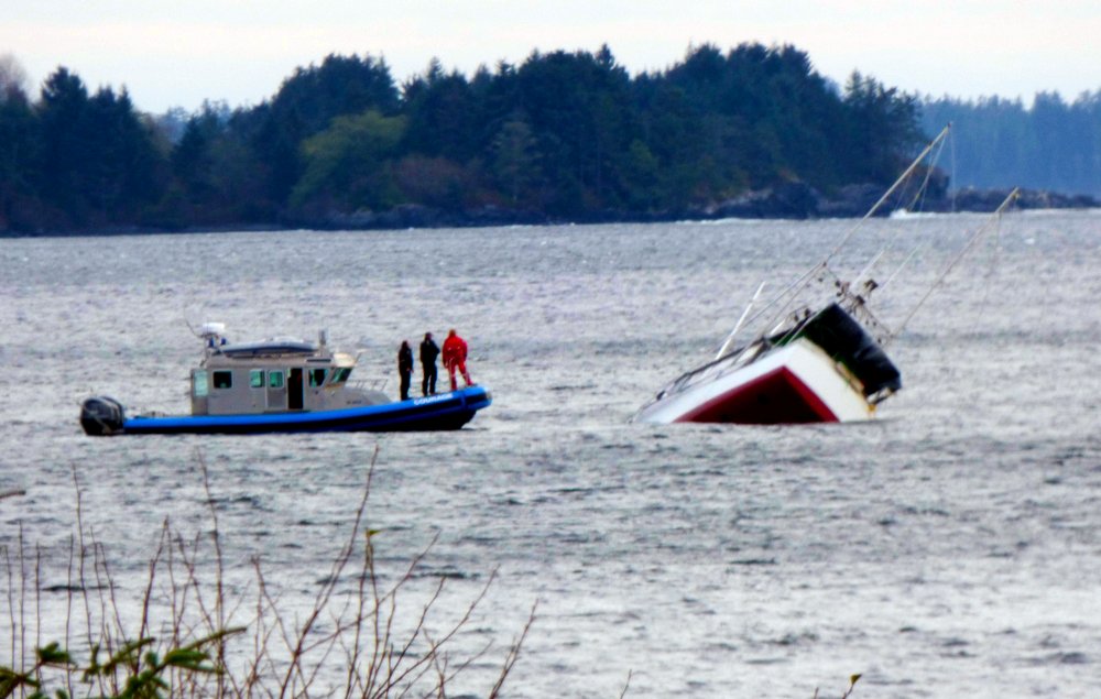 Troller rolls, sinks in high winds outside of Sitka Harbor Alaska