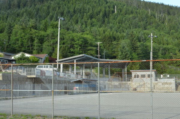 A fieldwith some mountains in the background