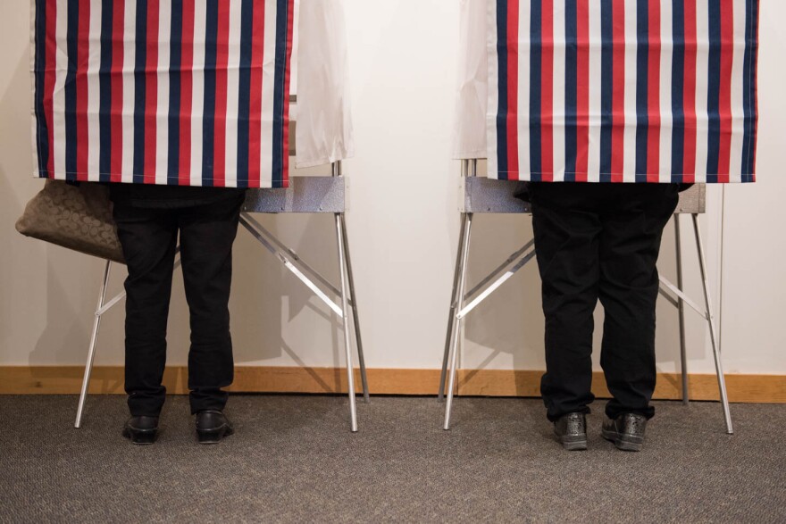 two people voting